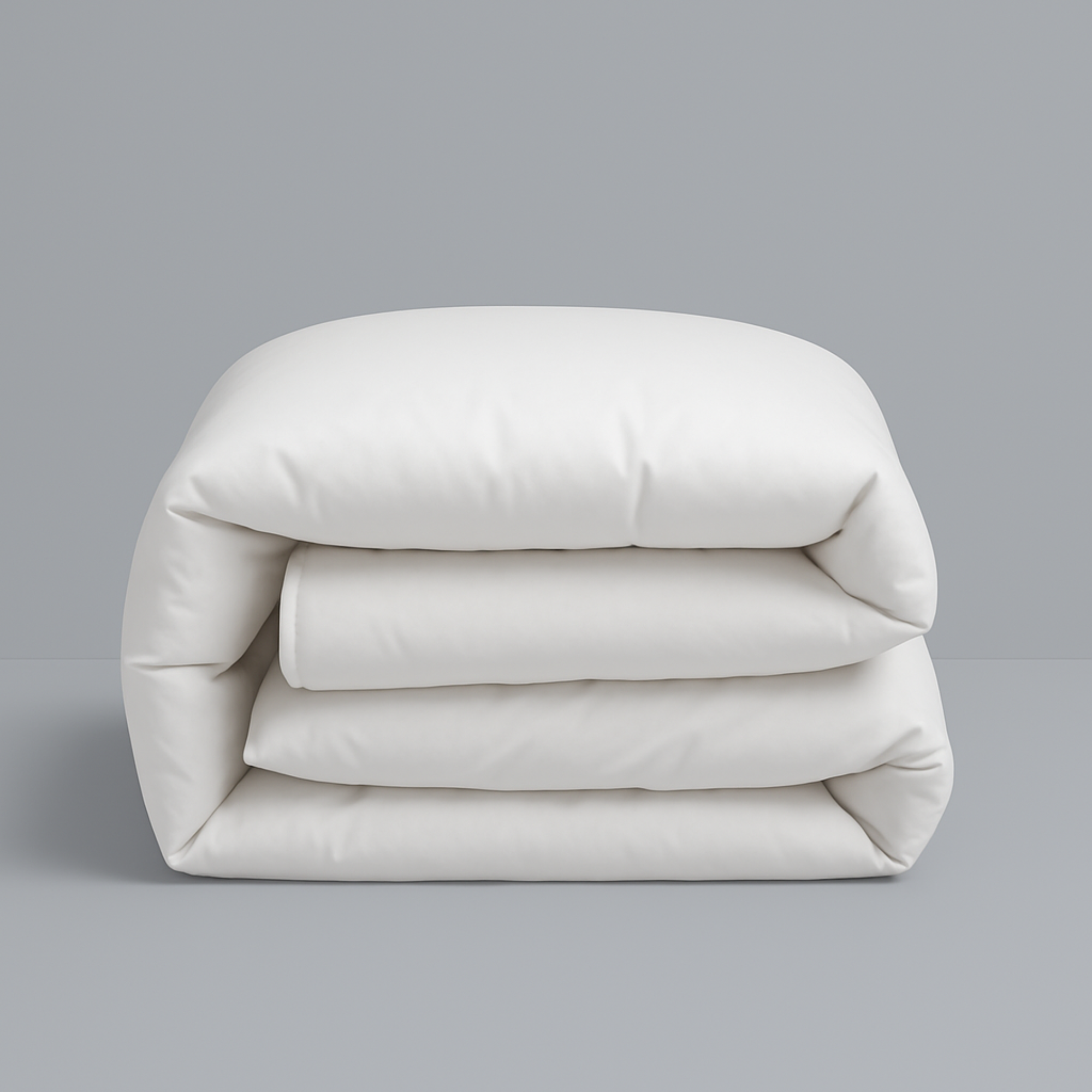 Royal Elite Canadian Hutterite White Duck Down Duvet Insert Comforter with 700 fill power, folded to showcase its plush loft and white 400 thread count sateen cotton down proof shell.
