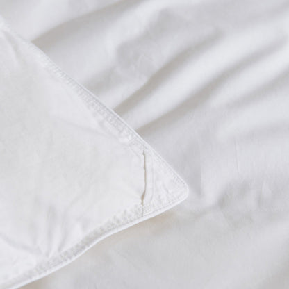 Close-up of one of four corner loops on the Royal Elite Feather Duvet for securing it inside a duvet cover.